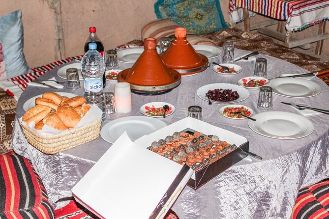 Agafay Desert Camel Ride from Marrakech with Dinner & Live Music - Getting dressed for the dromedary ride