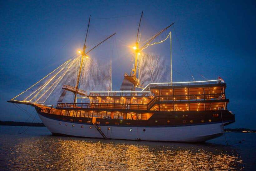 Bali Phinisi Cruise: Sunset Dinner with Live Music & Buffet - Sailing along the Nusa Dua coast at sunset