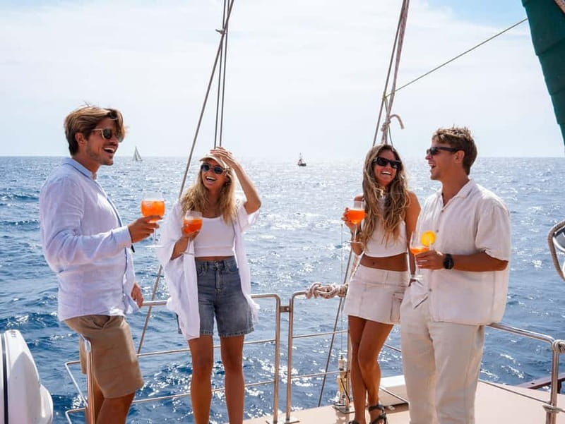 Barcelona: Sunset Sailing Cruise with Live Music - The bar, snacks, and what the price really covers