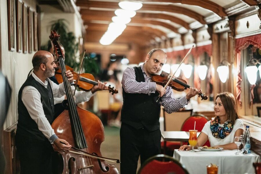 Budapest: Dinner Cruise with Live Music and Folk Dance Show - The National Theatre and the return route