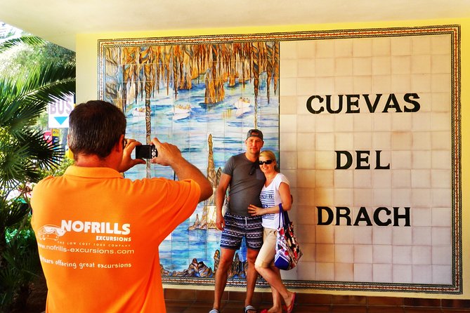 Caves of Drach Half-Day Tour with Boat Trip and Music Concert - Lake Martel, the boat, and the footbridge