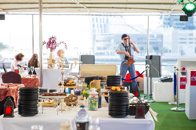 Dubai Marina Dinner Cruise with Live Music & Open Bar - Boarding the glass houseboat