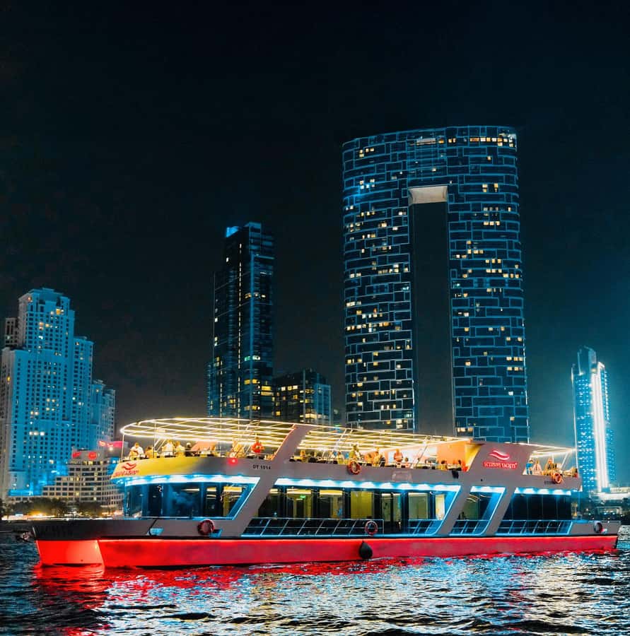 Dubai: Sunset or Dinner Cruise with Live Music & Open Bar - Dubai Marina at sunset, with dinner already covered