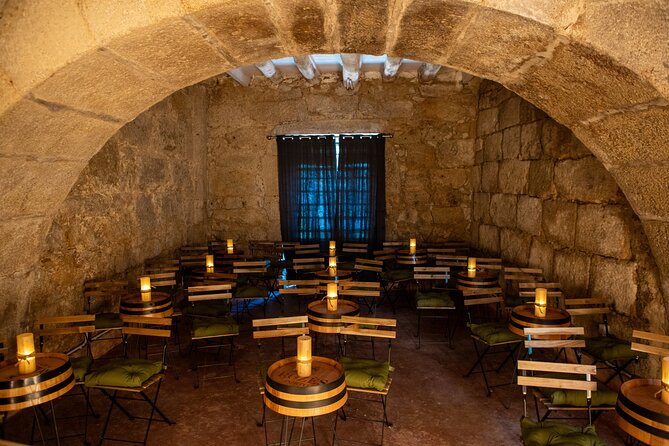 Entrance to The Fado House in São João Novo - The singer and the two guitars