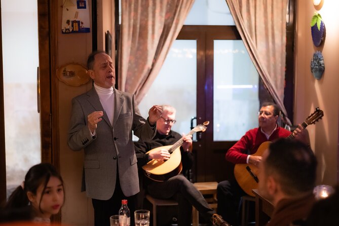 Fado Musical Experience with Portuguese Wine & Appetizers - Portuguese appetizers and a glass of wine