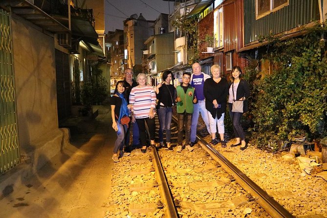 Hanoi Vespa After Dark Street food + Train Street+ Live Music - Who will enjoy this evening most?