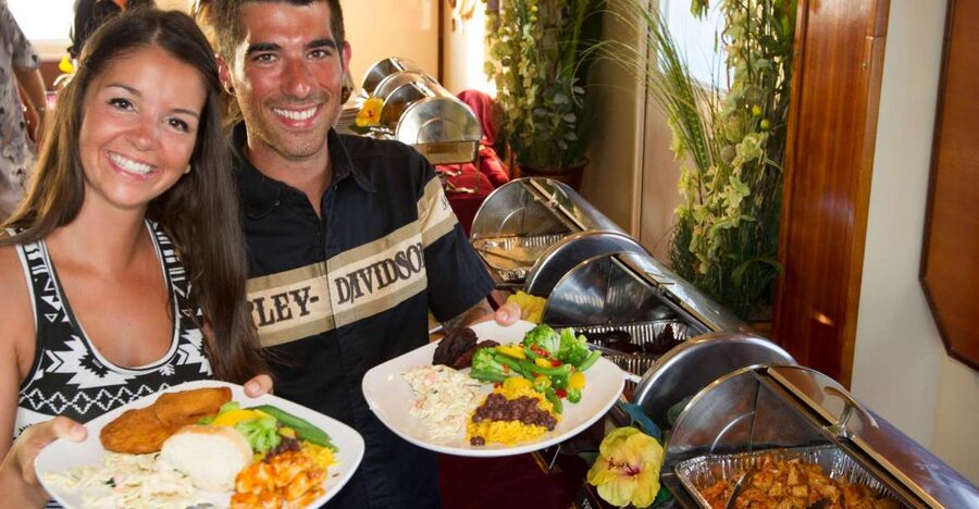 Key West: Sunset Dinner Cruise with Open Bar & Live Music - The first hour: harbor views and a tropical buffet