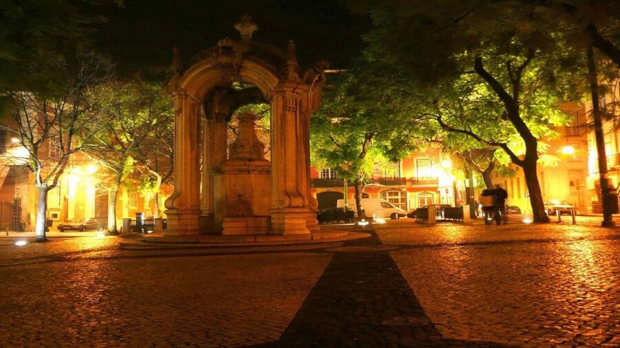 Lisbon: Evening City Tour with Dinner and Live Fado Show - Central Lisbon by illuminated streets