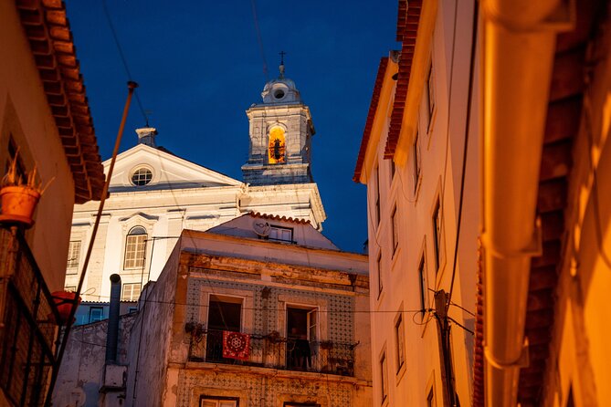 Lisbon Fado Dinner Show and Panoramic Night Tour - Lisbon at night, seen from the passenger seat