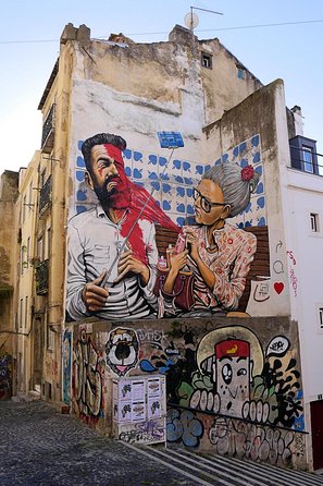 Lisbon Fado History Cultural Walking Tour - Walking into Mouraria from Rossio Square