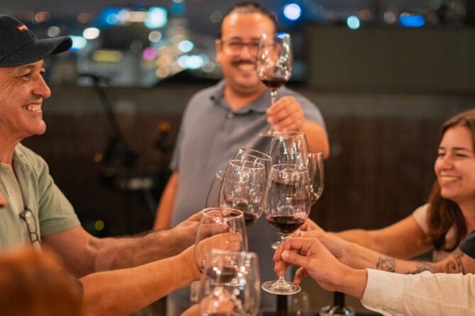 Lisbon: Rooftop Wine Tasting with Live Traditional Fado - Portuguese cheese and charcuterie on the table