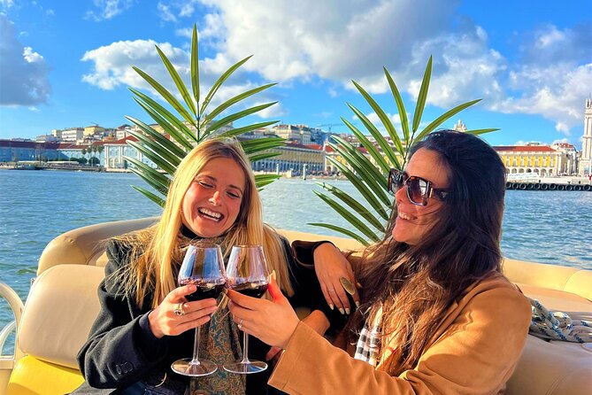 Lisbon Sunset Experience: Cruise, Wine and Live Music by the Capt - Passing under the 25 de Abril Bridge