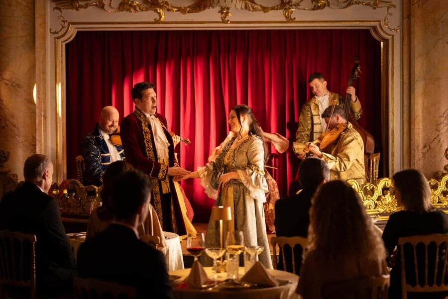 Mozart Dinner Opera in Prague with Audio Guide - Entering Boccaccio Hall in Prague’s Old Town