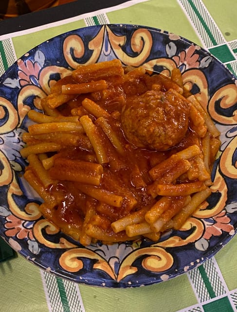 Naples: Authentic Family Home Lunch with Music Show & Spanish Quarters Tour - What arrives on the Neapolitan lunch table