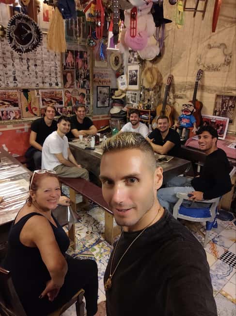 Naples: Authentic Family Home Lunch with Music Show & Spanish Quarters Tour - The Maradona mural and modern Naples