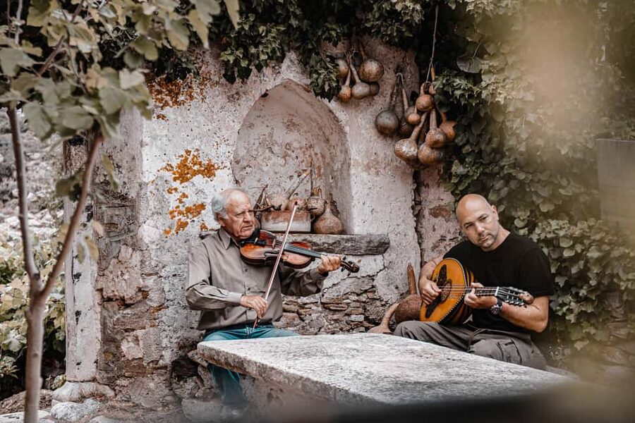 Naxos: Family Farm-table Cooking, Kouros Tour & Live Music - Lunch, local wine, and music from the family