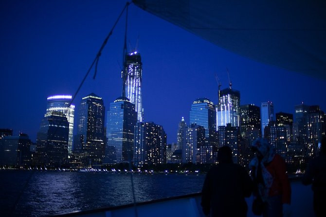New York City Sunset Jazz Sail aboard Clipper City - Ellis Island and the harbor’s immigrant gateway