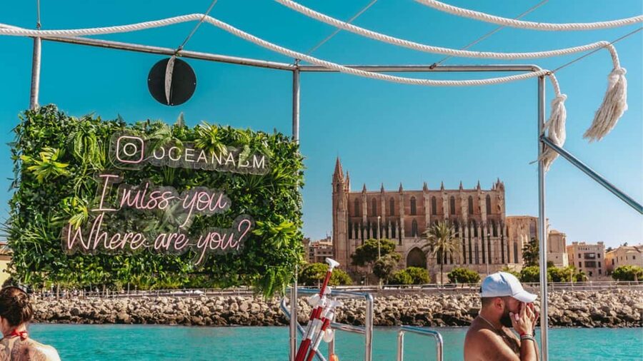 Palma: Punta Negra and Ses Illetes Boat Trip with Live Music - Swimming, snorkeling, and paddle surfing