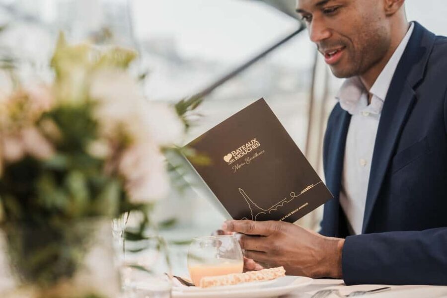 Paris: 4-Course Dinner Cruise on Seine River with Live Music - Four courses, wine, and a formal French setting