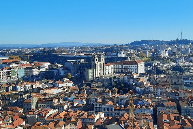 Porto Heritage Night Tour With Fado Show And Dinner Included - Transport, group size, and hotel drop-off