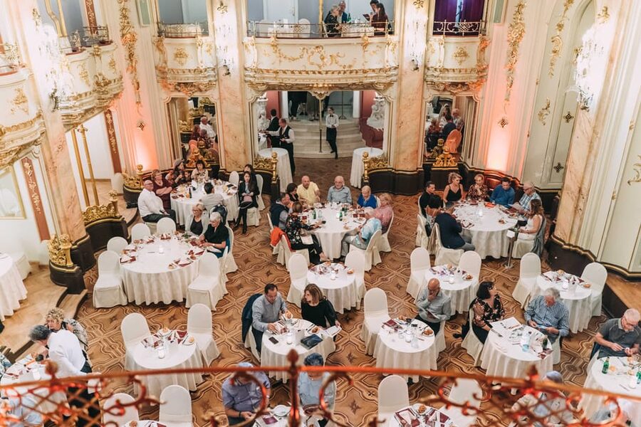 Prague: Mozart Ballroom Concert Ticket with 3-Course Dinner - Entering the Boccaccio Ballroom at Grand Hotel Bohemia