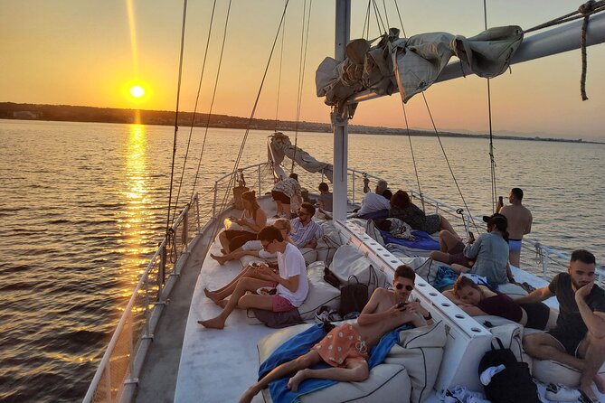 Rhodes Exclusive Sunset tour Cocktail Open bar Gourmet Live Music - Leaving Mandraki beside the medieval harbor