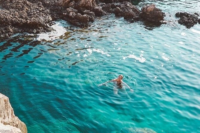 Rhodes Sunset Cruise - Swim and Dine w/ Live Music & Sunset! - Leaving Mandraki beside the old port