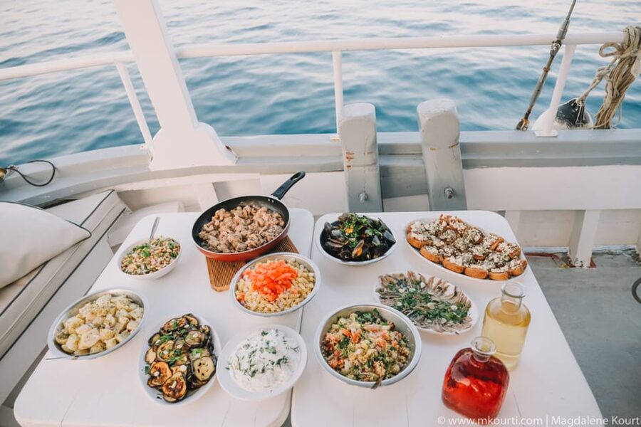 Rhodes: Sunset Cruise with Live Music, Wine & Greek Buffet - Live music changes the mood on the return