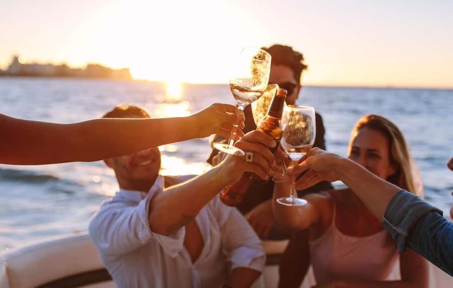 Rhodes: Sunset Cruise with Open Bar, Dinner, & Live Music - The Kallithea Bay swim stop