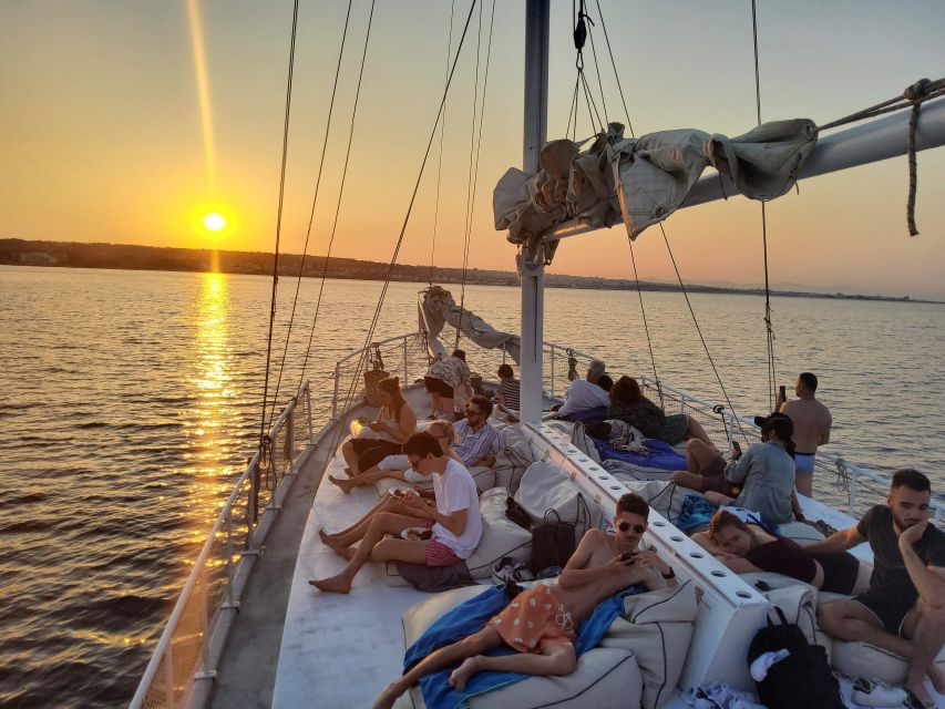 Rhodes: Sunset Cruise with Open Bar, Dinner, & Live Music - Dinner with Greek flavors and choices for different diets