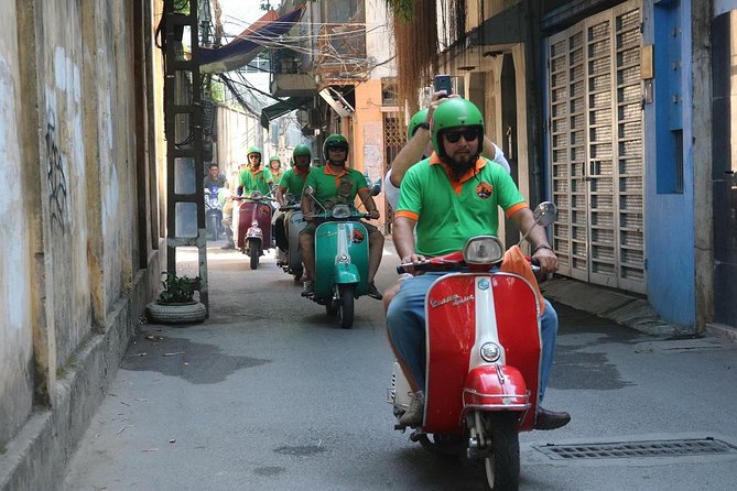 Saigon After Dark Vespa Street Food Tour + Live Music 4 hours - Banh xeo, nem lui, and the back-street route