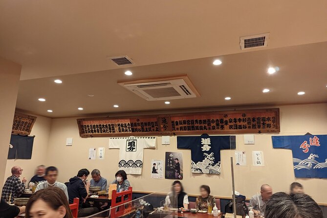 Tsugaru shamisen performance over traditional dinner - Hozomon and Senso-ji in a compact history walk
