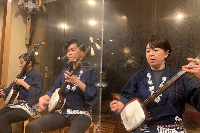 Tsugaru shamisen performance over traditional dinner - Who will enjoy this experience most?